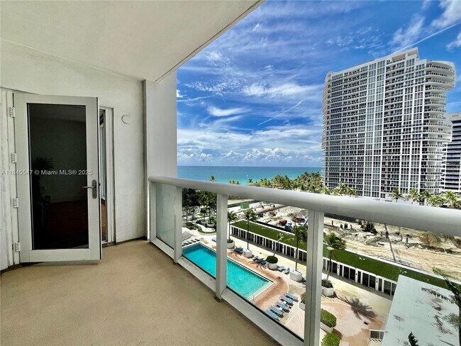 Building Photo - 10275 Collins Ave