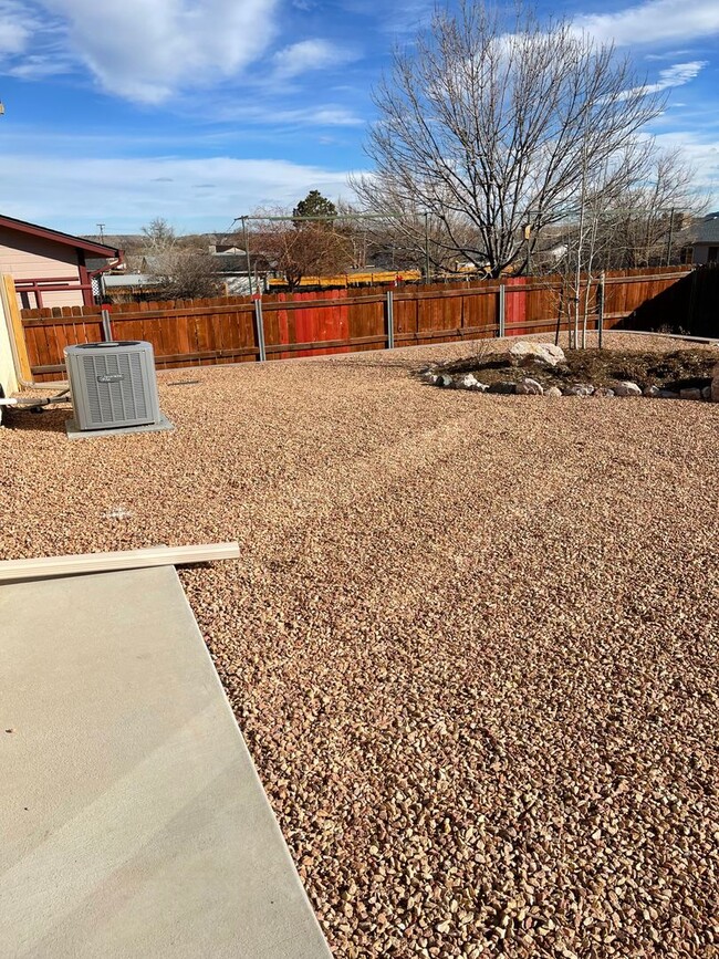 Building Photo - 3 Bedroom 2 Bath With a 2 car garage
