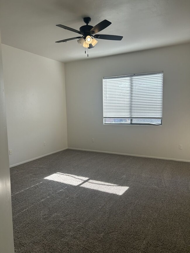 Building Photo - Unfurnished four bedroom large home!  Three car garage