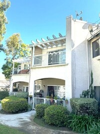 Building Photo - 2 Bedroom, 2 Bath Upstairs Condo with Private Balcony & 2-Car Garage, Gated Community, Water/Tras...