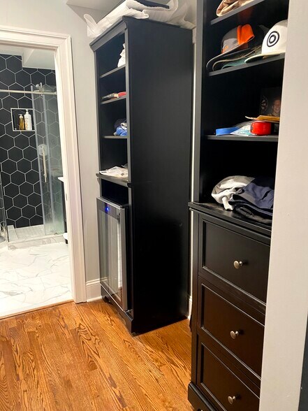 2nd floor primary bedroom closet with wine fridge - 17 U St NW