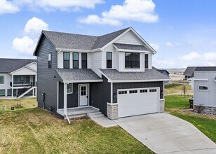 Building Photo - Spacious 4-Bedroom Home with 2-Car Garage & Yard