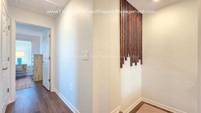 Building Photo - EXCEPTIONAL AND SPACIOUS FURNISHED TOWNHOME WITHIN WATERSIDE- NAUTIQUE!