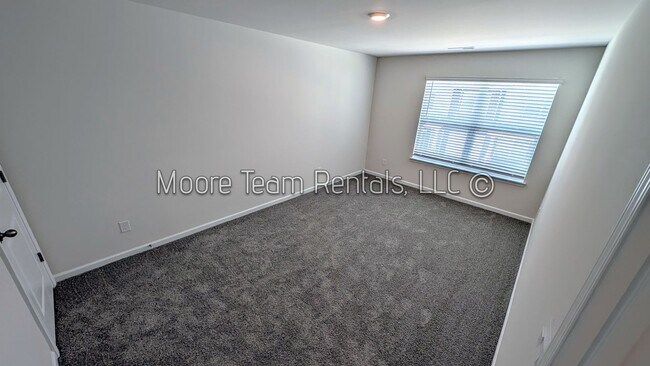Building Photo - Elegant New 3BR Townhome in Arden – Garage...