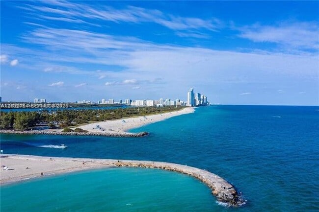 Building Photo - 10275 Collins Ave