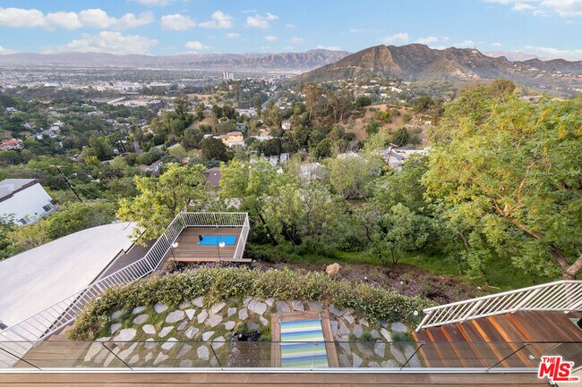Building Photo - 7191 Pacific View Dr