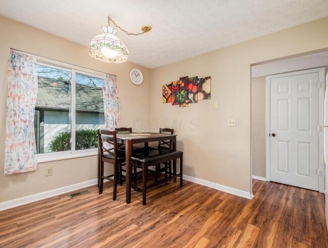Building Photo - 6985 Muirfield Dr