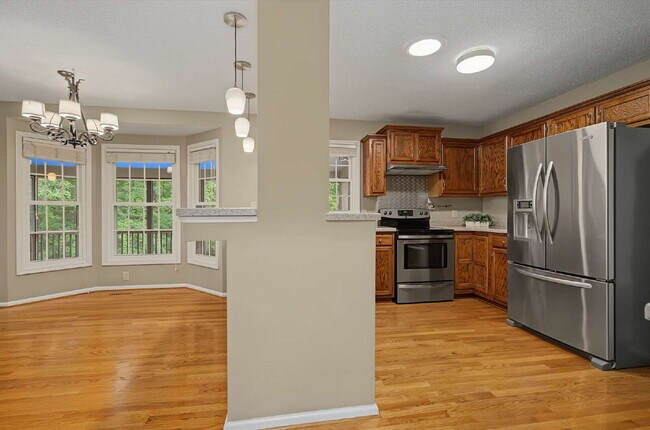 Building Photo - Spacious 4-Bed Oasis with Basement in Cary