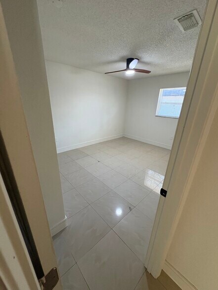 Building Photo - 7133 Pinewood Dr