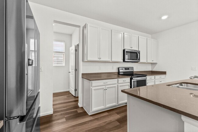Building Photo - Beautiful 4 Bedroom Home in The Lakes at Centerra | 2,583 Sq. Ft.
