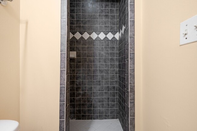 Building Photo - Spacious 2BR/2.5BA Townhome with Finished Basement & Extra Storage