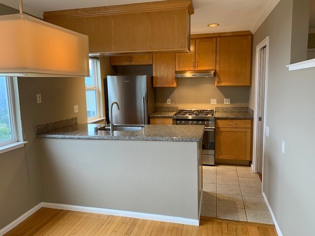 view from dining room into kitchen - 6415 Snake Rd