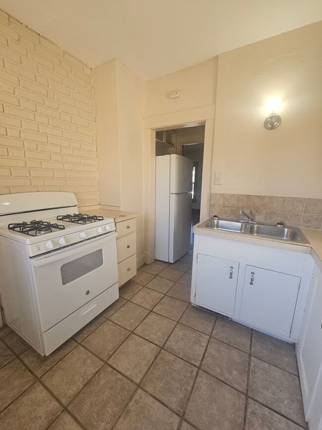 Building Photo - There is a $25 fee for the application and everyone over 18 needs to fill out their own application.