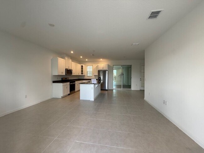 Building Photo - Brand new construction 3 Bedroom Town Home in Island Village of Celebration
