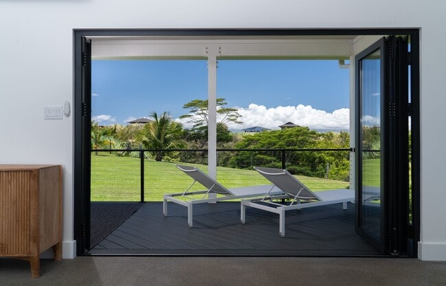 Building Photo - Elevated Haiku Retreat with Ocean Views, Designer Finishes & a Lush Edible Garden Sanctuary