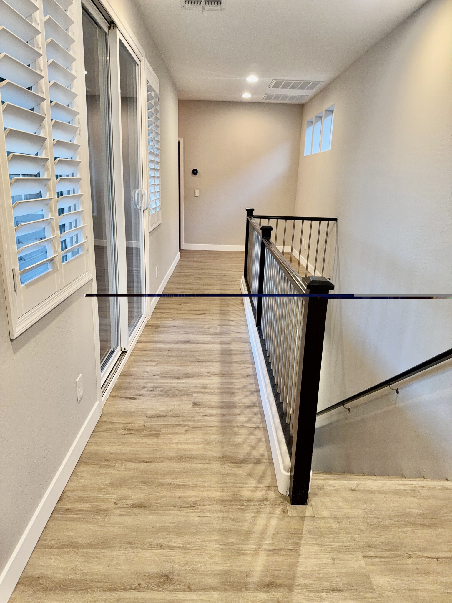 hallway &l loft - 1326 N Zane Dr