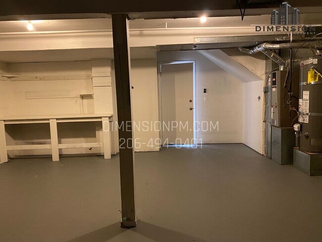 Building Photo - Stylishly Renovated Home with Private Back...