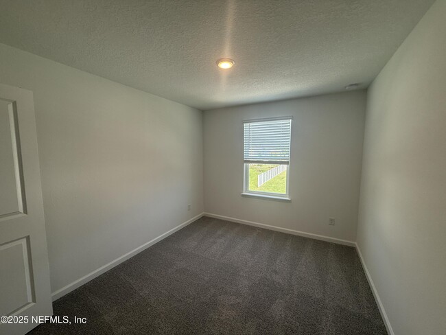Building Photo - 6850 Rhapsody Rd
