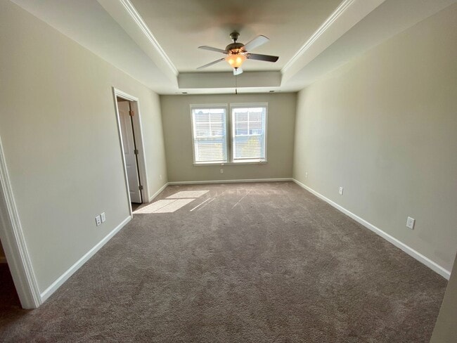 Building Photo - 3 bed/2.5 bath at end unit townhome in Berkeley Walk at Savannah Quarters with garage