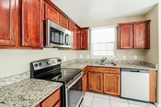 Building Photo - 4935 N Cancun Dr