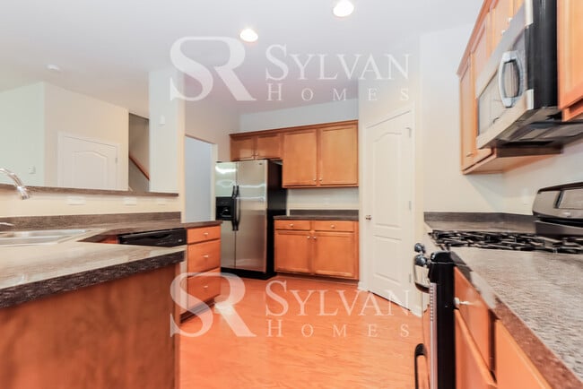 Building Photo - Turn the key. Enter. Smile. Repeat every day!