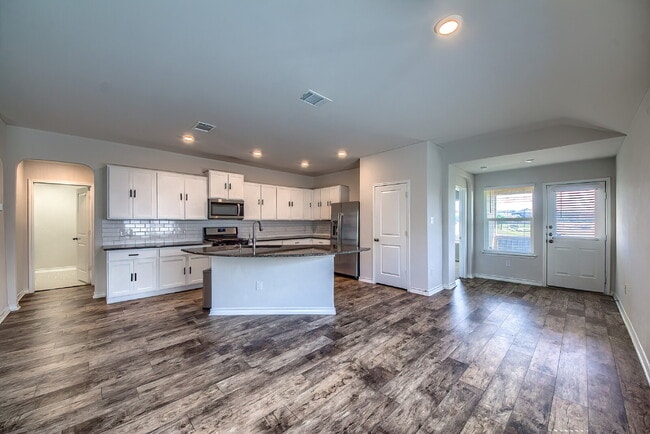 Building Photo - Welcome to this beautifully maintained 4-bedroom, 2-bathroom home in the highly desirable Whisper...
