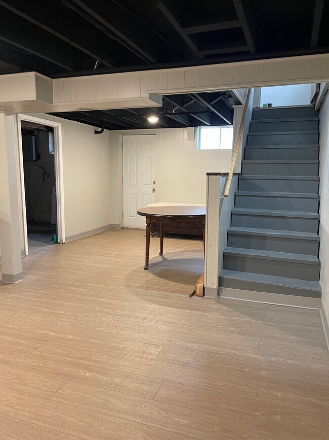 Lower level with utility room/ laundry facilities - 9404 High Hill Ct