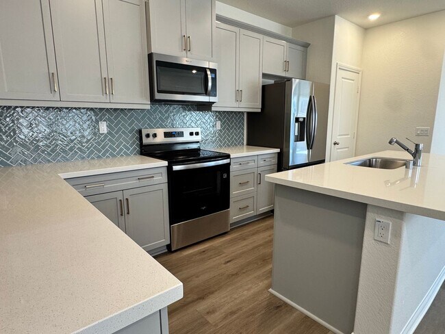 Building Photo - For Lease | Spacious 4-Bed + Den & Loft | ...