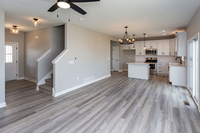 Building Photo - Spacious 4-Bedroom Home with 2-Car Garage & Yard