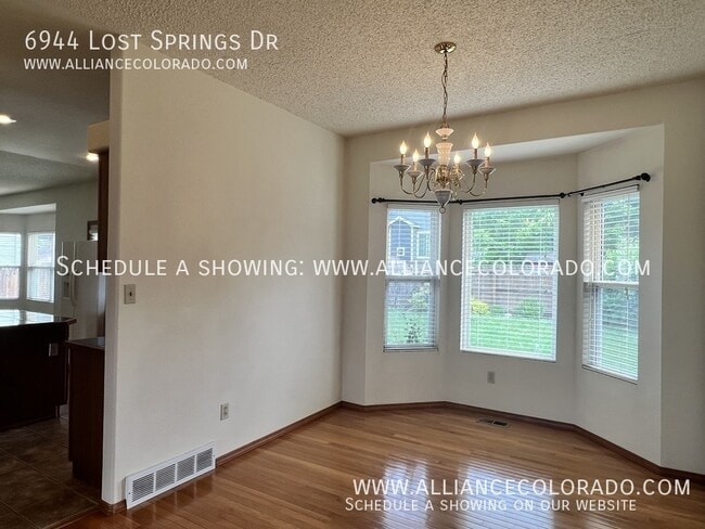Building Photo - 6944 Lost Springs Dr