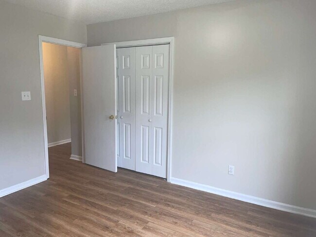 Building Photo - Two Bedroom Two Full Bathroom End Unit Tow...