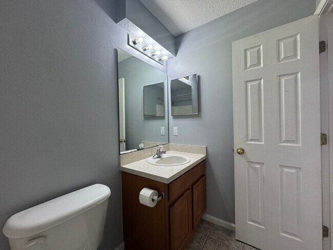 Building Photo - Available Now! Westside Timothy's Landing 2/2.5 Townhome with a 1-Car Garage