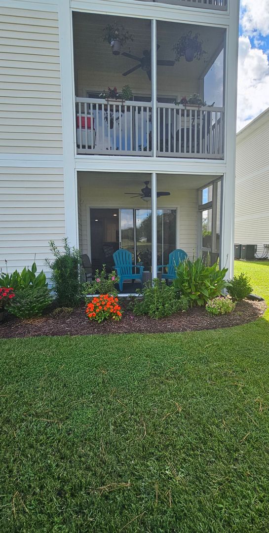 Building Photo - -First-Floor End-Unit | Fully Furnished 2B...