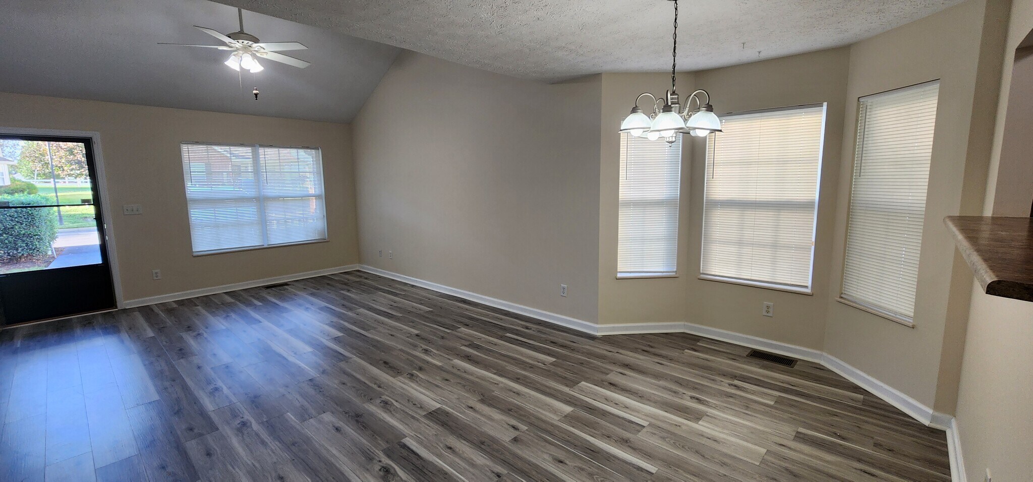 Living and dining rooms from kitchen - 1521 Mayberry Ln