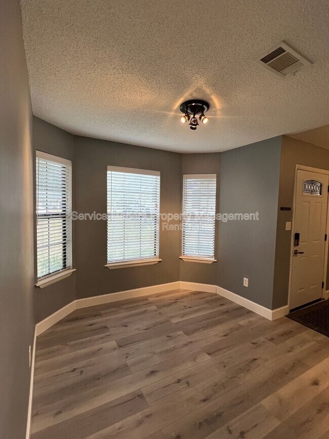 Building Photo - 7777 Needlerush Dr