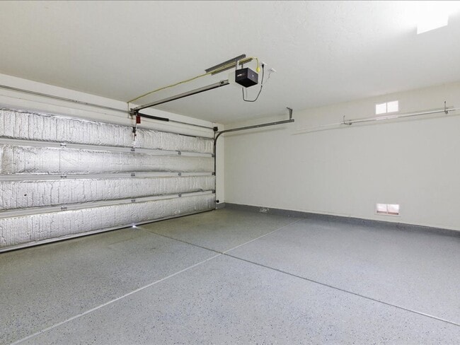 Building Photo - Spacious Living in a Gated Community with Amenities!