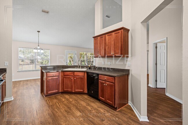 Building Photo - Beautiful 4-Bed 2-Bath Home on Corner Lot in Gated Community