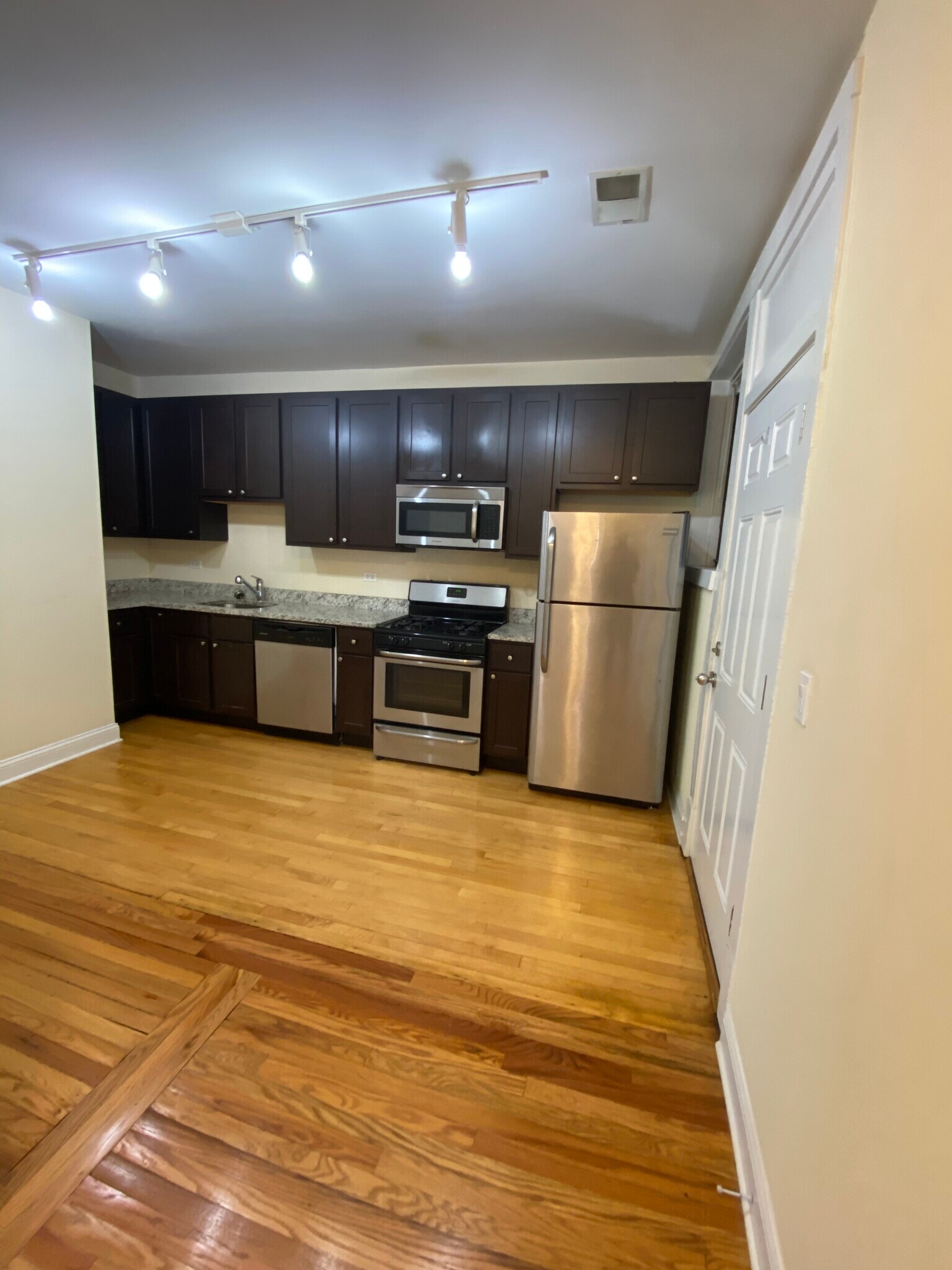 Modern kitchen with dine in space - 4056 N Harding Ave