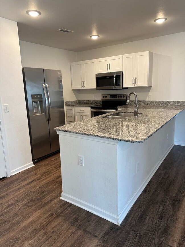 Building Photo - Newly built 3 bedroom, 2 bathroom duplex w...