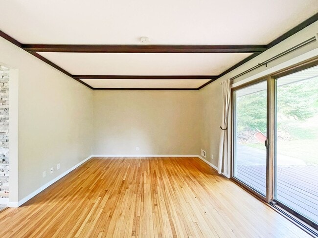 Building Photo - Spacious Redone Rambler with Huge 1/2 Acre Yard, Deck, Patio, Primary Suite, 3-BRs on Main Level ...
