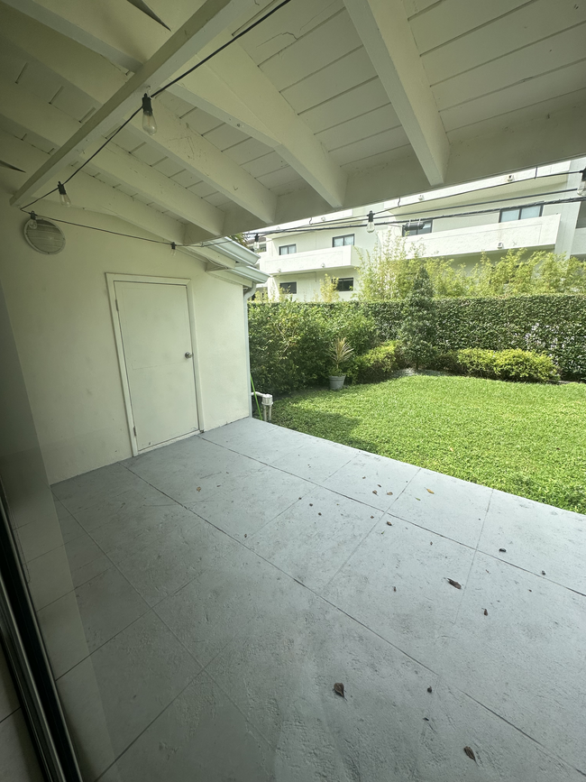 View of private backyard from living room - 5400 Orduna Dr