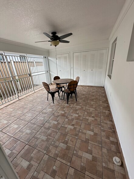Exterior large covered patio 1/2 - 403 SW 78th Pl