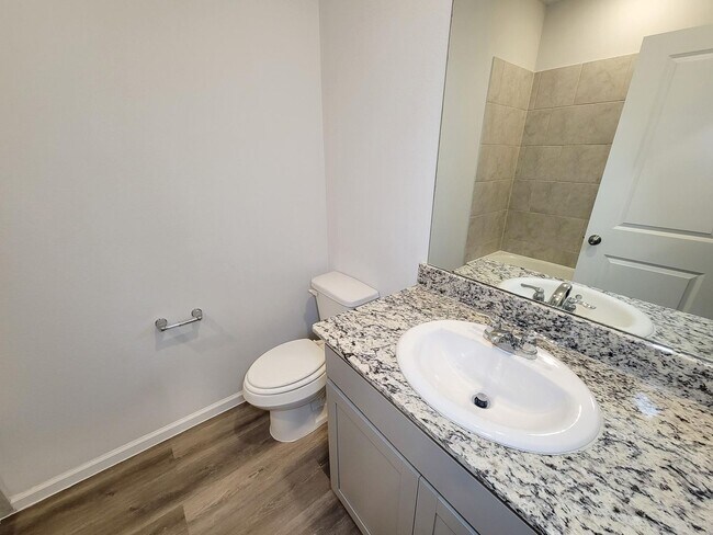 Building Photo - Welcome Home! Your never-lived-in sanctuary awaits your arrival. Have a large household? This 5-b...