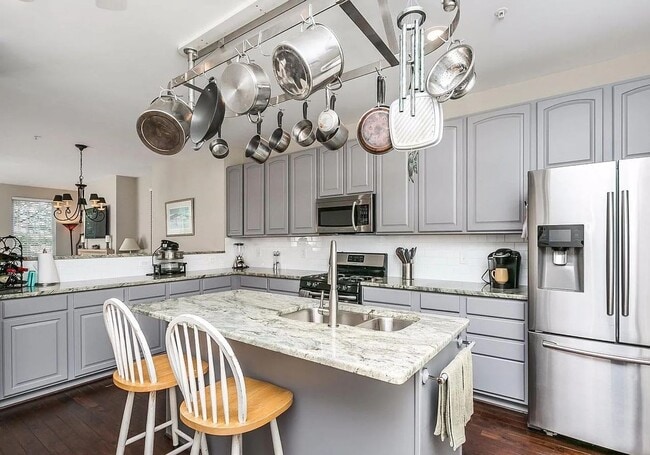 Building Photo - Coming Soon – 3BR/4BA End-Unit Townhome wi...