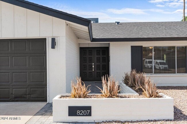 Building Photo - 8207 E Montebello Ave