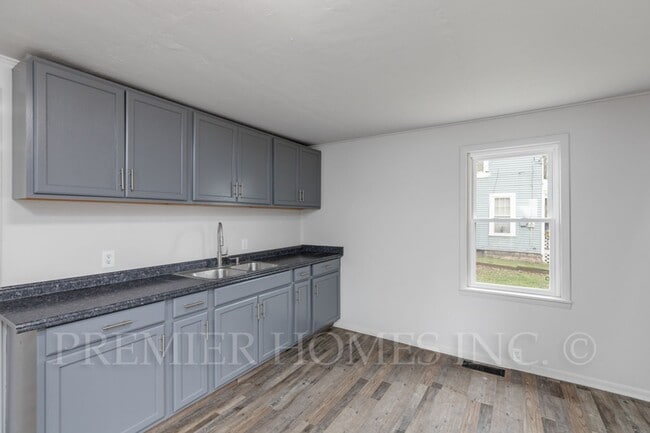Building Photo - 3 Bed Home with Basement & Off-Street Parking – $1,395/mo