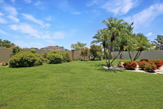 Building Photo - Annual rental: Spacious 3BR/2BA Creekwood Home with Office, Screened Lanai, EV Charger & Resort-S...