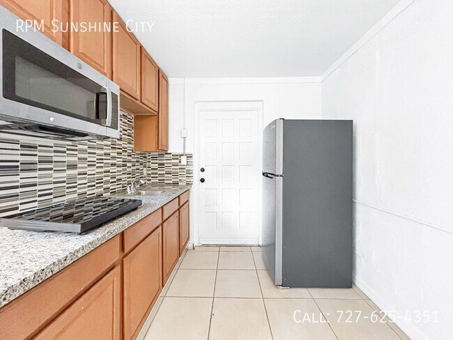 Building Photo - 3684 14th Ave SE