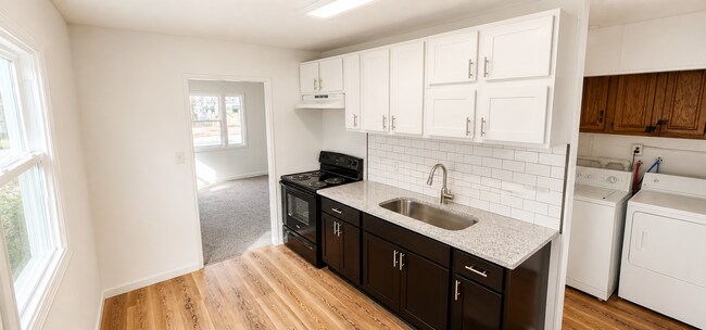 Building Photo - Two Bedroom House - Garage and Fenced in yard