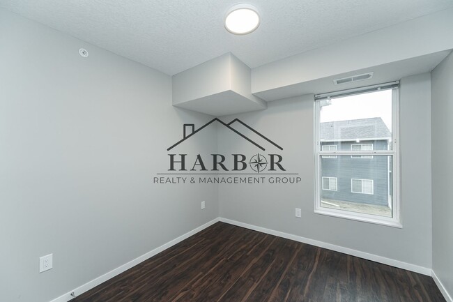 Building Photo - Brand NEW Caroline Apartments 201 -  Move ...